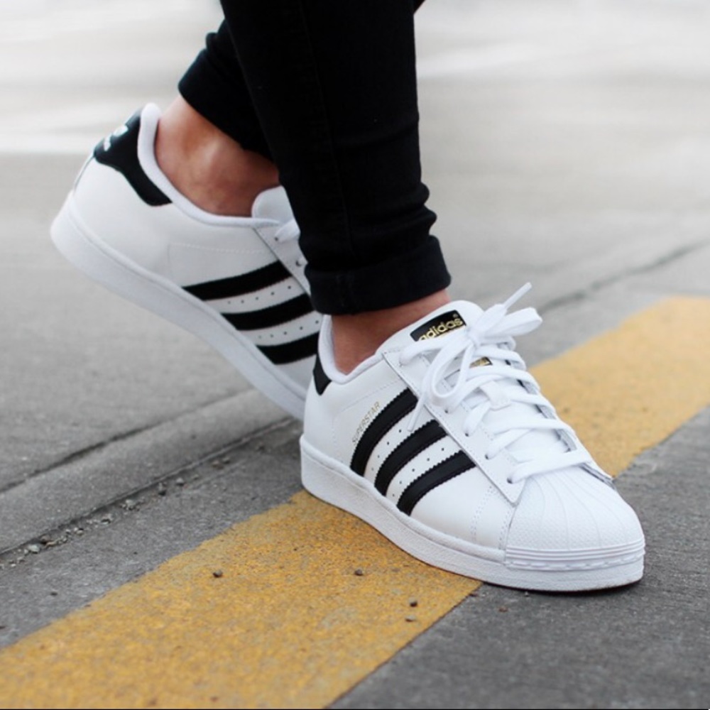 ADIDAS shoes. Fits a kid size 4 & woman size 5.5!